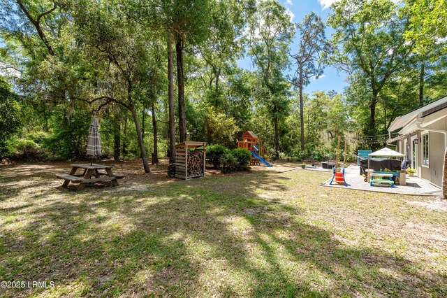 12 Harvest Ln, Beaufort, SC 29907 - view of yard with a patio and a playground