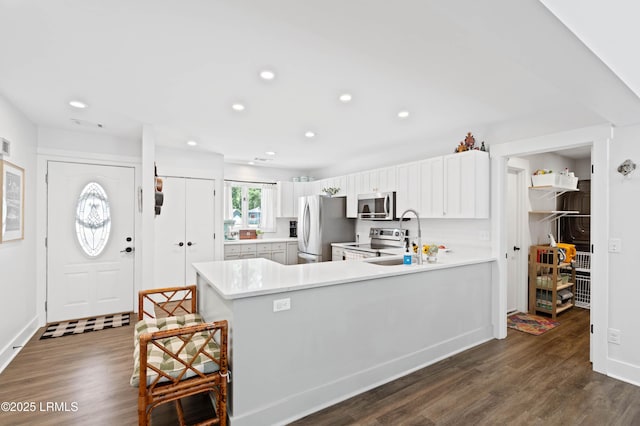 12 Harvest Ln, Beaufort, SC 29907 - kitchen featuring recessed lighting, a peninsula, and appliances with stainless steel finishes