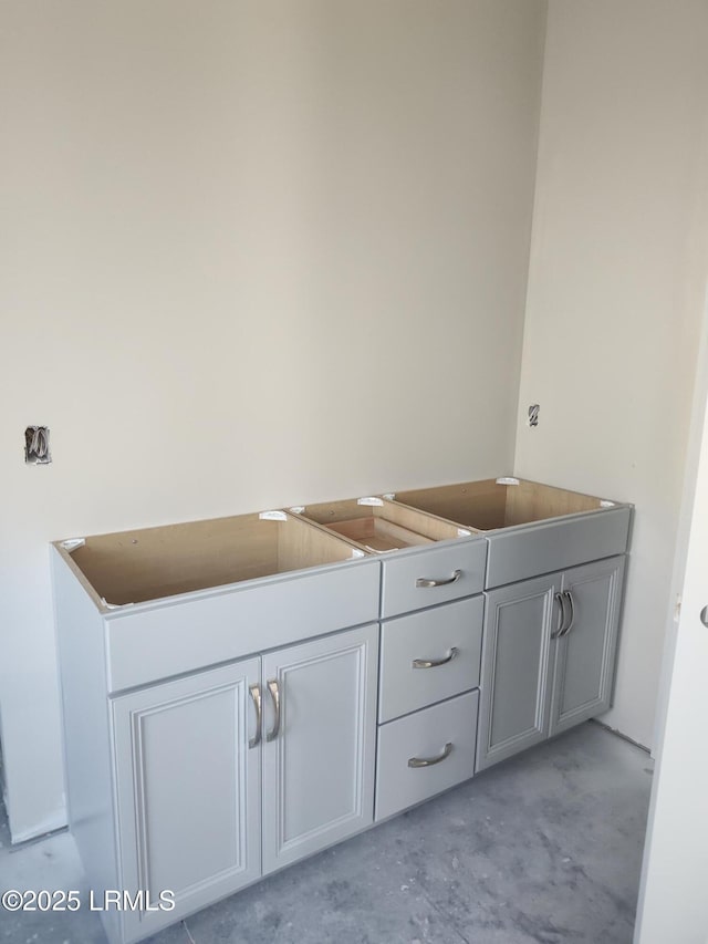 bathroom featuring concrete flooring