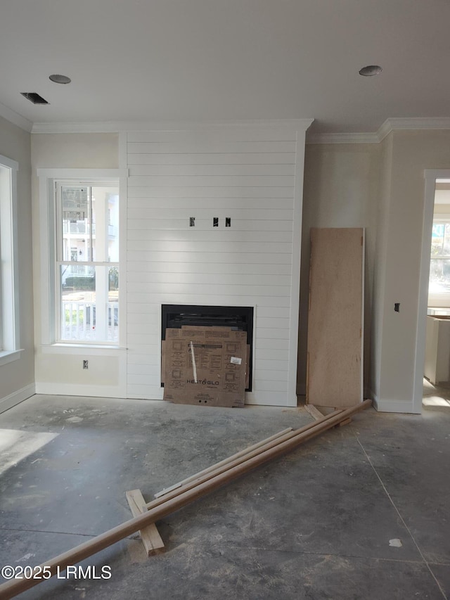 unfurnished living room with a fireplace and ornamental molding