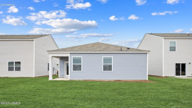 1533 Sanctum St, Ridgeland, SC 29936 - rear view of property with a yard, a shingled roof, and a patio