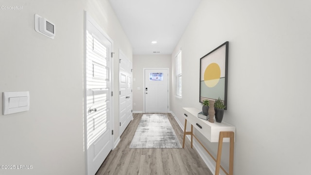 1533 Sanctum St, Ridgeland, SC 29936 - doorway with healthy amount of natural light, light wood-style flooring, and recessed lighting