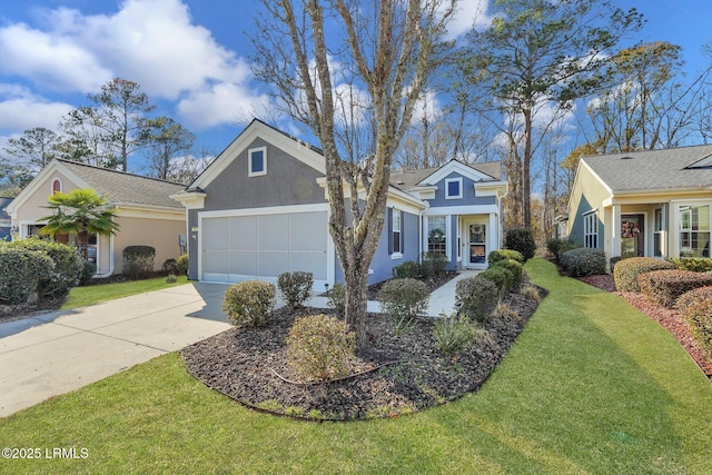 view of front of home with a garage and a front yard