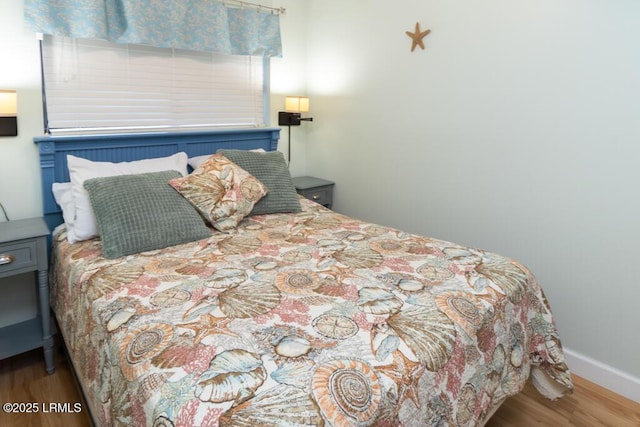 40 Folly Field Rd Unit 202B, Hilton Head Island, SC 29928 - bedroom featuring hardwood / wood-style flooring