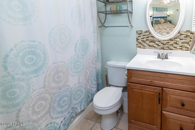 40 Folly Field Rd Unit 202B, Hilton Head Island, SC 29928 - bathroom featuring tasteful backsplash, vanity, tile patterned flooring, and toilet