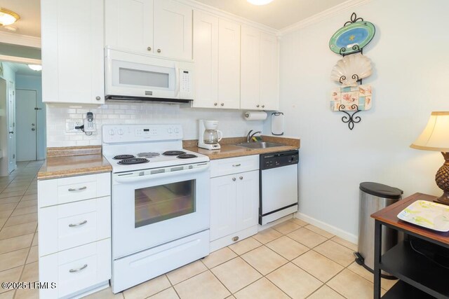 40 Folly Field Rd Unit 202B, Hilton Head Island, SC 29928 - kitchen with sink, backsplash, white cabinets, crown molding, and white appliances