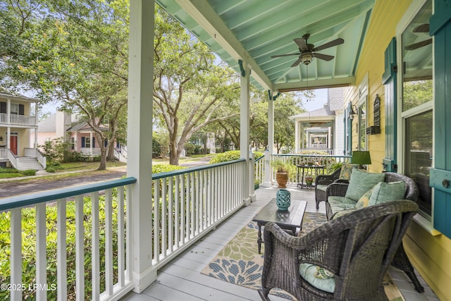 1009 9th St, Port Royal, SC 29935 - porch with ceiling fan, an outdoor living space, and a residential view