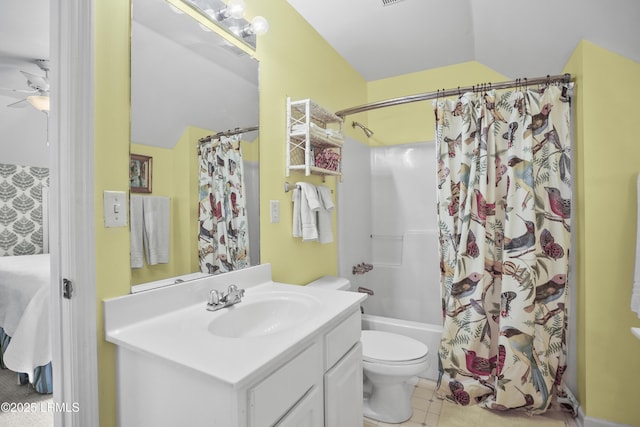 1009 9th St, Port Royal, SC 29935 - full bathroom featuring vanity, shower / bath combo, ceiling fan, tile patterned floors, and lofted ceiling