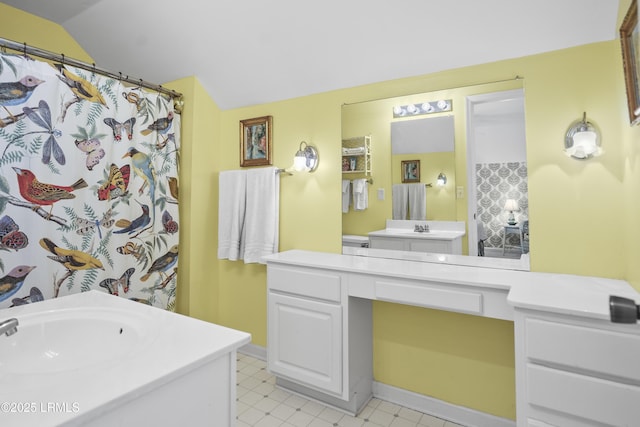 1009 9th St, Port Royal, SC 29935 - full bath with vanity, tile patterned floors, and vaulted ceiling