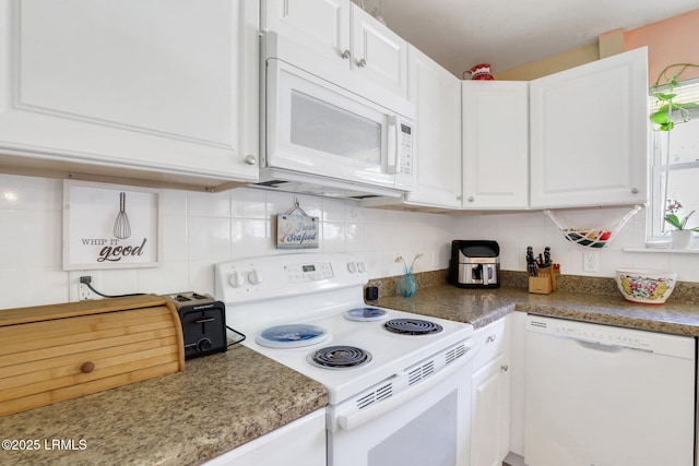 kitchen with white cabinetry, white appliances, and tasteful backsplash