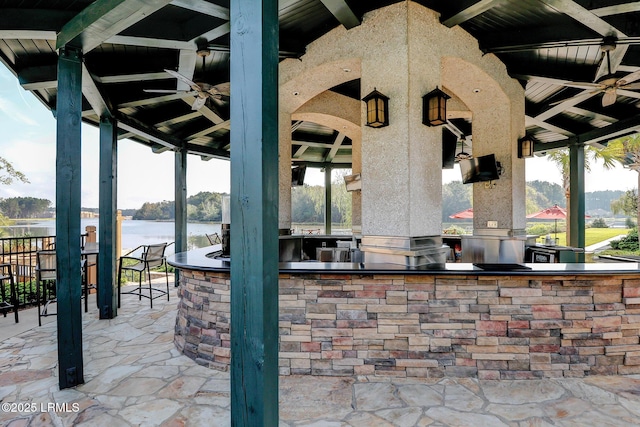 10 Anchor Bay Ct, Bluffton, SC 29910 - view of patio with an outdoor kitchen, a gazebo, a water view, and ceiling fan