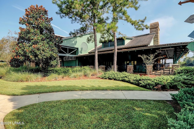 10 Anchor Bay Ct, Bluffton, SC 29910 - back of house featuring a chimney and a yard