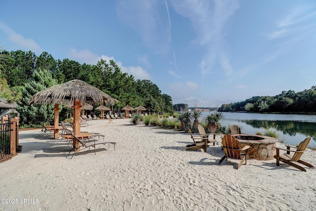 10 Anchor Bay Ct, Bluffton, SC 29910 - view of playground featuring an outdoor fire pit and a water view