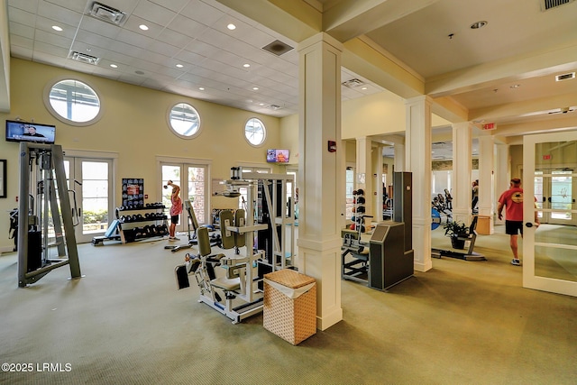 10 Anchor Bay Ct, Bluffton, SC 29910 - gym featuring decorative columns, carpet floors, recessed lighting, and a towering ceiling