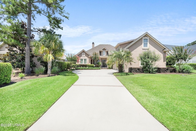 10 Anchor Bay Ct, Bluffton, SC 29910 - view of front of home featuring driveway, stucco siding, and a front yard