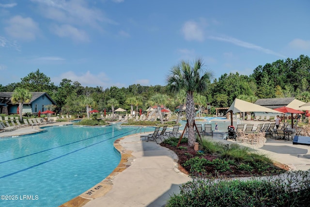 10 Anchor Bay Ct, Bluffton, SC 29910 - community pool featuring a patio and view of wooded area