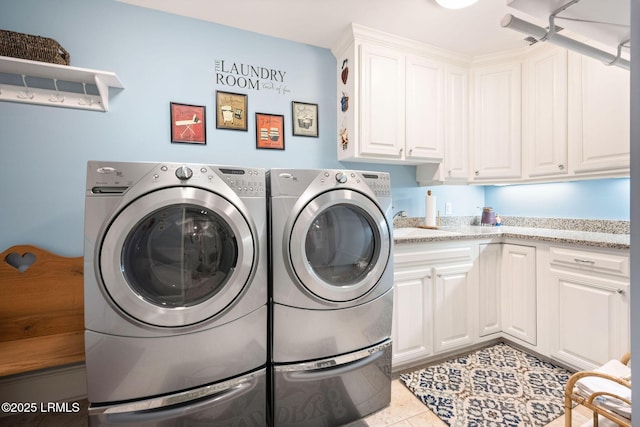 10 Anchor Bay Ct, Bluffton, SC 29910 - laundry area with independent washer and dryer, cabinet space, and tile patterned flooring