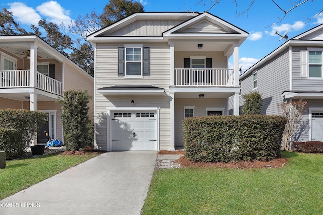 view of front of property with a garage and a front yard