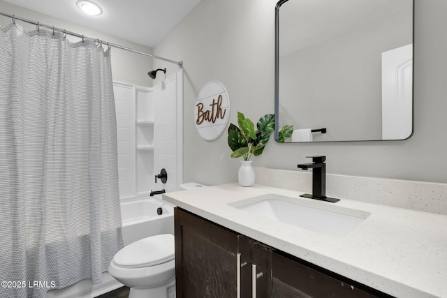 full bathroom featuring shower / bath combination with curtain, vanity, and toilet