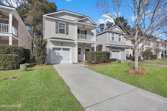 view of front of house with a garage, a front yard, and a balcony