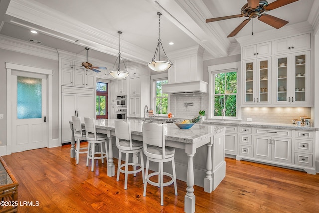 1448 Gleasons Landing Dr, Saint Helena Island, SC 29920 - kitchen featuring white cabinets, a ceiling fan, beamed ceiling, and decorative backsplash