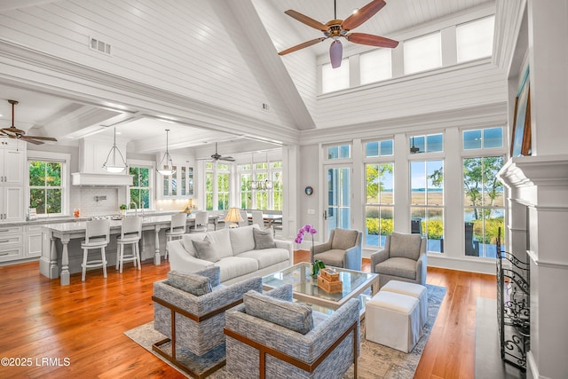 1448 Gleasons Landing Dr, Saint Helena Island, SC 29920 - living area with ceiling fan, visible vents, and a healthy amount of sunlight
