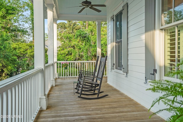 1448 Gleasons Landing Dr, Saint Helena Island, SC 29920 - wooden terrace with covered porch and ceiling fan