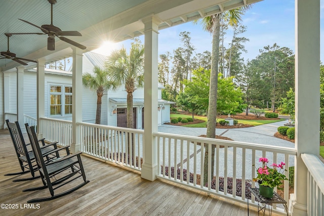 1448 Gleasons Landing Dr, Saint Helena Island, SC 29920 - deck featuring a ceiling fan and a porch