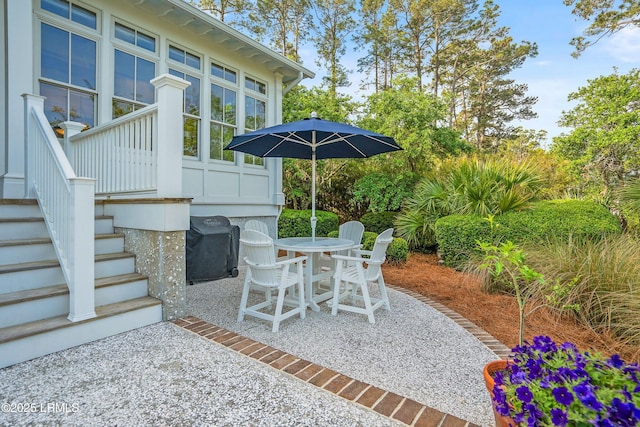 1448 Gleasons Landing Dr, Saint Helena Island, SC 29920 - view of patio with grilling area and outdoor dining space