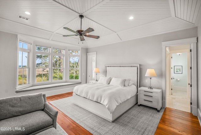 1448 Gleasons Landing Dr, Saint Helena Island, SC 29920 - bedroom featuring baseboards, visible vents, wooden ceiling, and wood finished floors