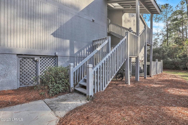 view of home's exterior featuring stairway