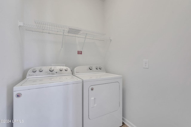 laundry room featuring independent washer and dryer