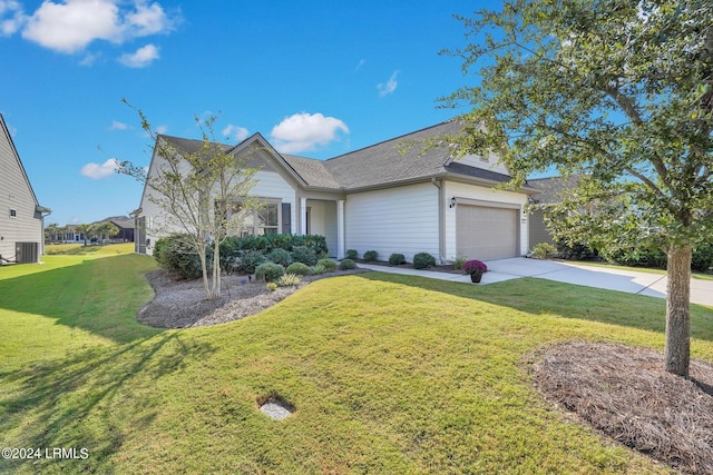 view of front facade with a garage and a front lawn