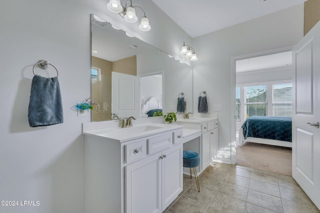 bathroom with vanity and tile patterned flooring