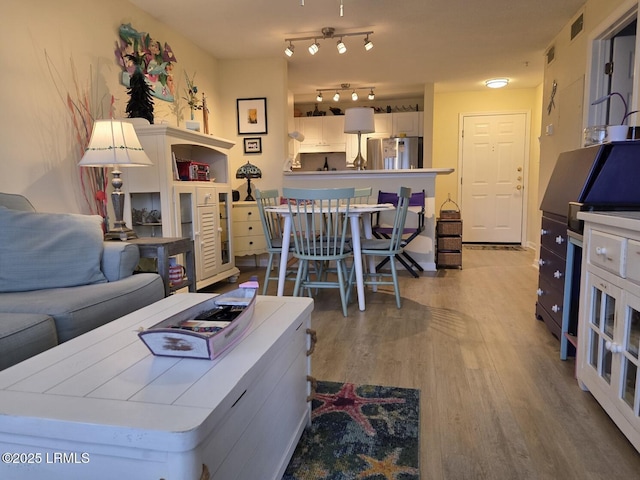 70 Helmsman Way Unit 1410, Hilton Head Island, SC 29928 - living area featuring wood finished floors