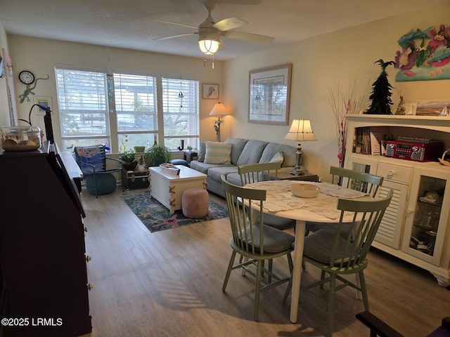 70 Helmsman Way Unit 1410, Hilton Head Island, SC 29928 - dining room with wood finished floors and ceiling fan