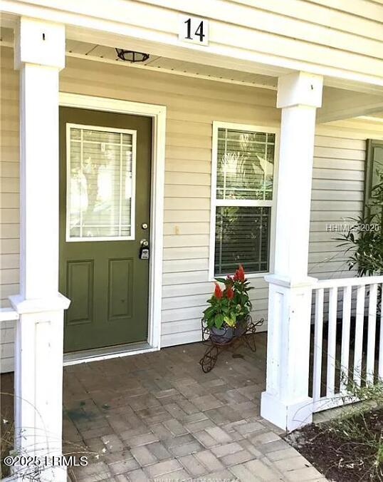 14 Arbormeade Cir, Bluffton, SC 29910 - doorway to property with a porch