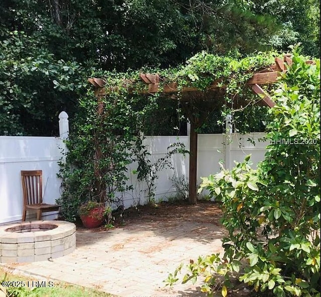 14 Arbormeade Cir, Bluffton, SC 29910 - view of patio / terrace featuring a fire pit