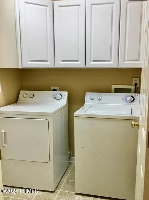 14 Arbormeade Cir, Bluffton, SC 29910 - laundry area with washing machine and dryer, cabinet space, and light tile patterned floors