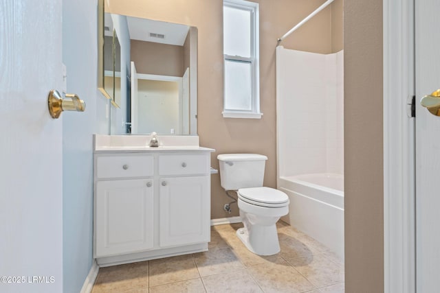 full bathroom featuring vanity, tile patterned flooring, bathing tub / shower combination, and toilet