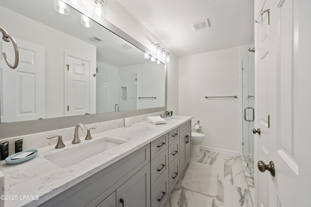 bathroom featuring vanity, an enclosed shower, and toilet