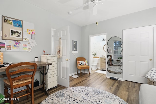 100 Kensington Blvd Unit 1503, Bluffton, SC 29910 - bedroom with an office area, dark wood-type flooring, baseboards, connected bathroom, and a ceiling fan