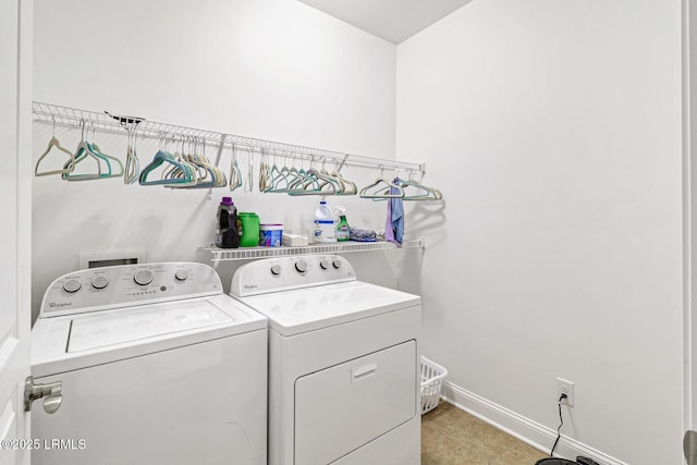 laundry room featuring separate washer and dryer