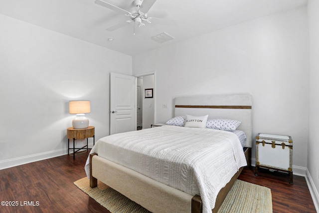 bedroom featuring dark hardwood / wood-style flooring and ceiling fan