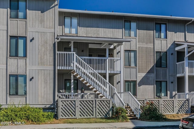 view of property featuring stairs