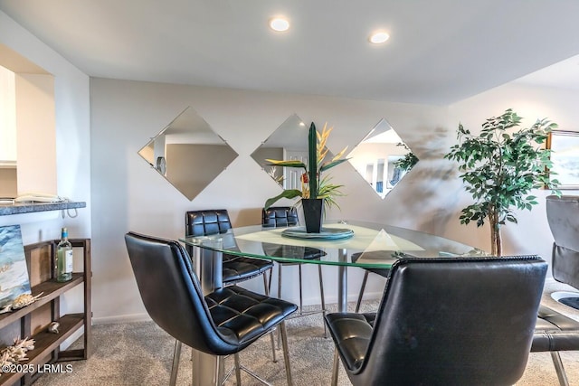dining room featuring baseboards, carpet, and recessed lighting