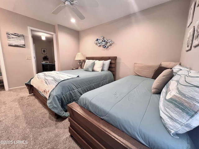 bedroom featuring carpet floors, a ceiling fan, and baseboards