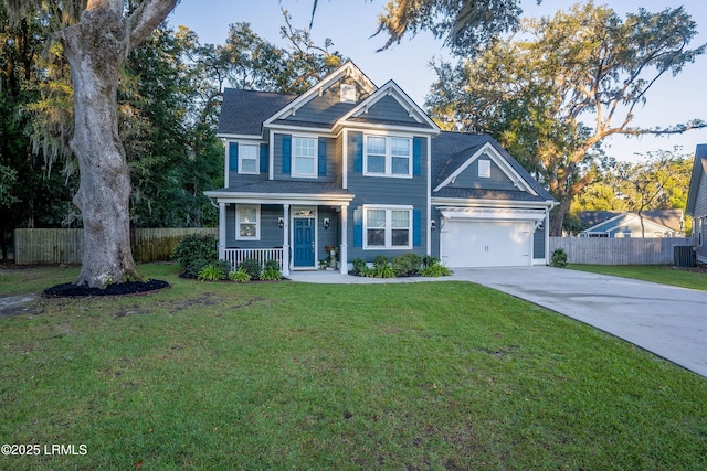 view of front of house with a garage, covered porch, a front yard, and central air condition unit