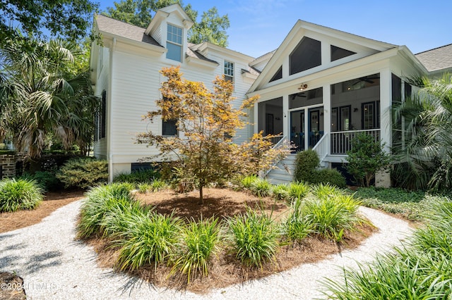 view of front of property featuring ceiling fan