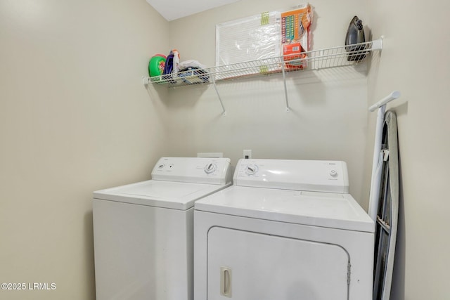 laundry area featuring laundry area and independent washer and dryer